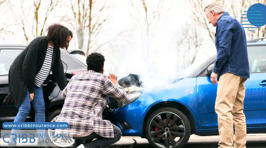 Driver taking photos of a minor car accident for insurance purposes