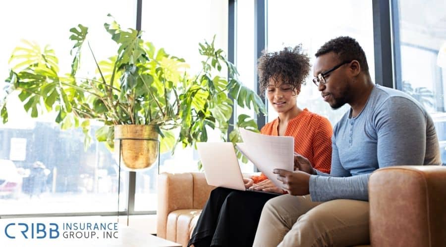 couple reviewing home insurance coverage