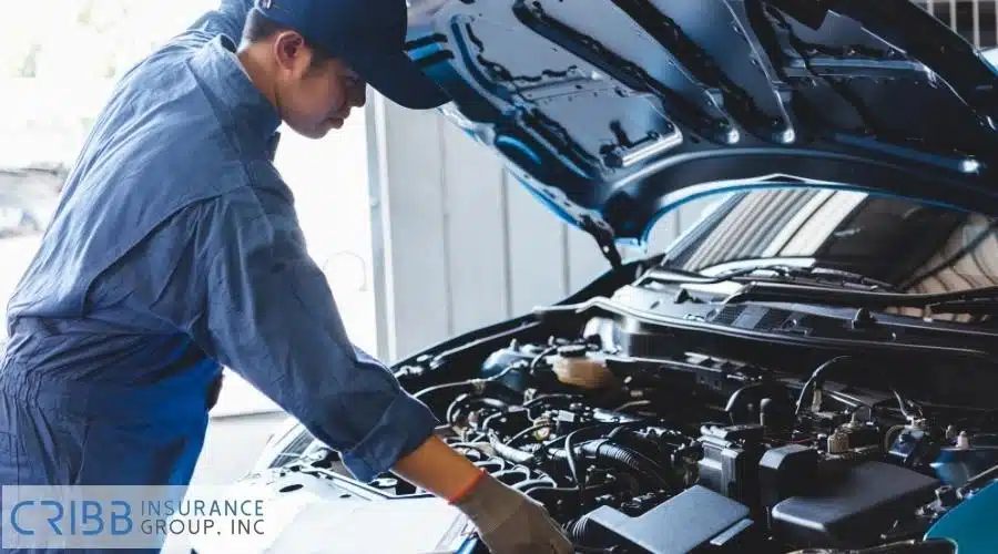 Mechanic performing warranty-covered repair