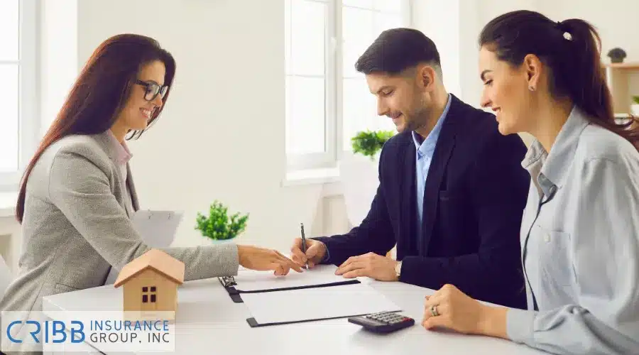 Signing a document for insurance beneficiary