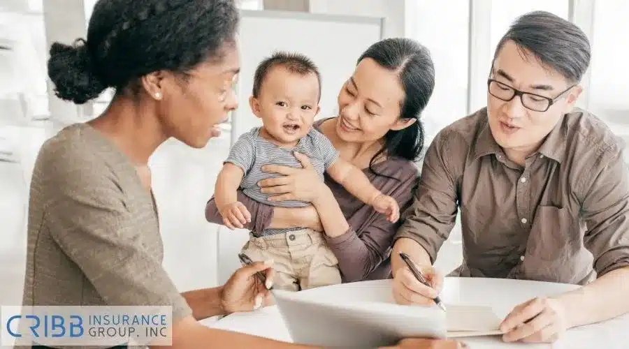 Family reviewing life and accident insurance